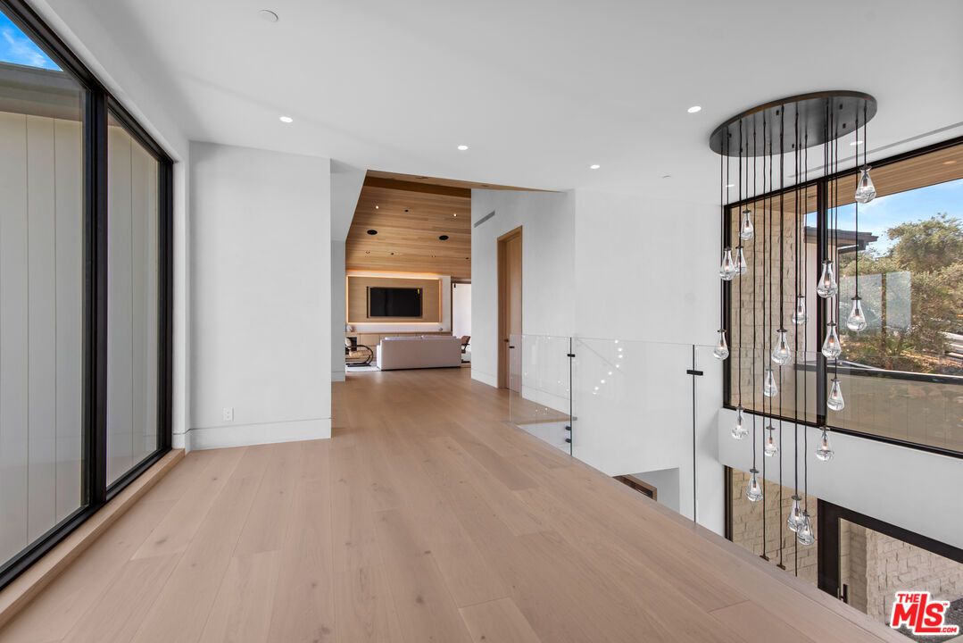 Fireplace, Interior, Pendant Lights, Recessed Lighting, Wood Texture Flooring, Wooden Walls