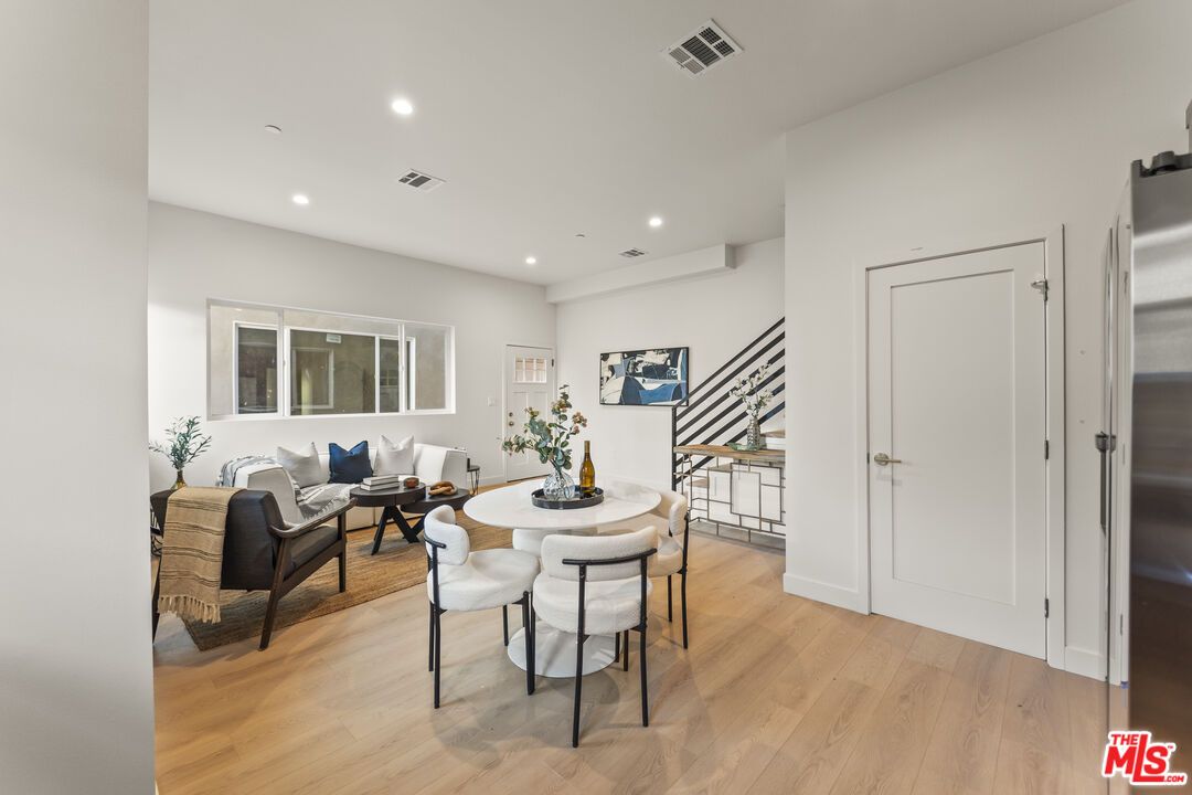 Dining room, Interior, Living room, Recessed Lighting, Stainless Steel Appliances, Wood Texture Flooring