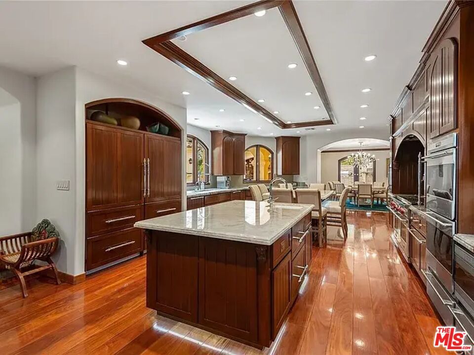 Chandelier, Dining room, Interior, Kitchen, Recessed Lighting, Stainless Steel Appliances, Wood Texture Flooring