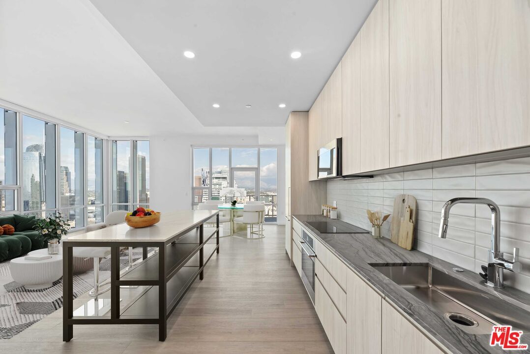 Dining room, Interior, Kitchen, Recessed Lighting, Stainless Steel Appliances, Water, Wood Texture Flooring