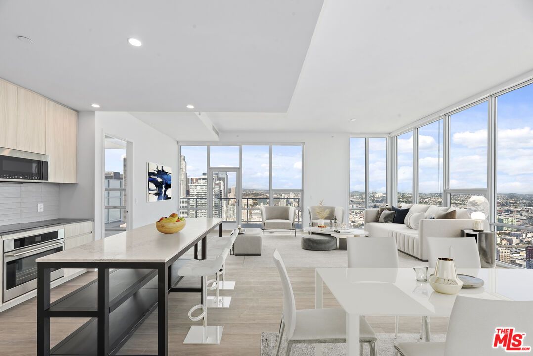 Dining room, Interior, Kitchen, Living room, Recessed Lighting, Water, Wood Texture Flooring