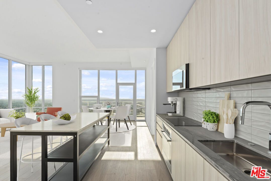 Dining room, Interior, Kitchen, Recessed Lighting, Stainless Steel Appliances, Water, Wood Texture Flooring