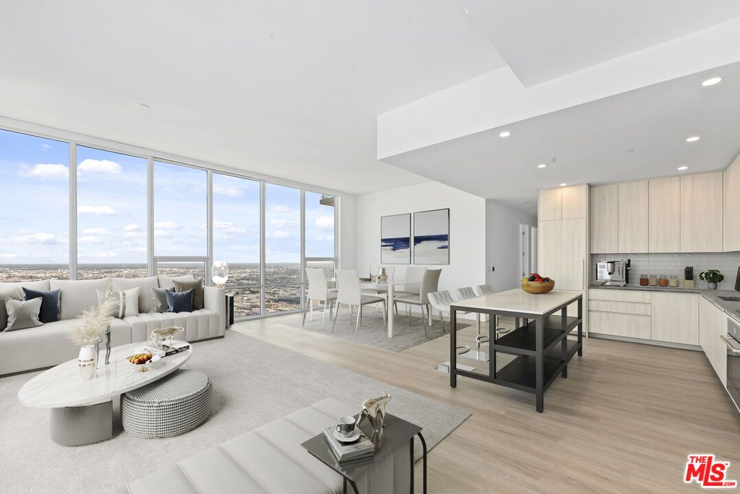 Dining room, Interior, Kitchen, Living room, Recessed Lighting, Stainless Steel Appliances, Water, Wood Texture Flooring