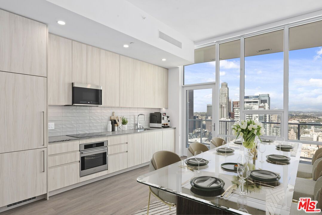 Dining room, Interior, Kitchen, Recessed Lighting, Stainless Steel Appliances, Wood Texture Flooring