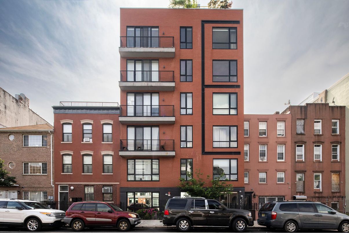 Exterior, Facade, Brick Facade, Condo Building
