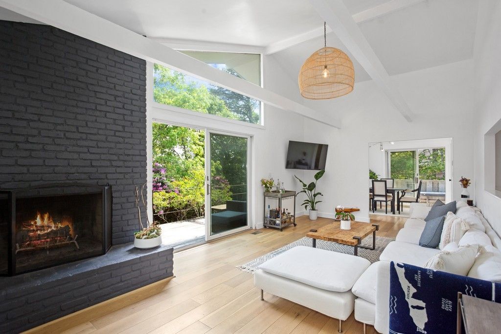 Dining room, Fireplace, Interior, Living room, Pendant Lights, Stone Walls, Wood Texture Flooring