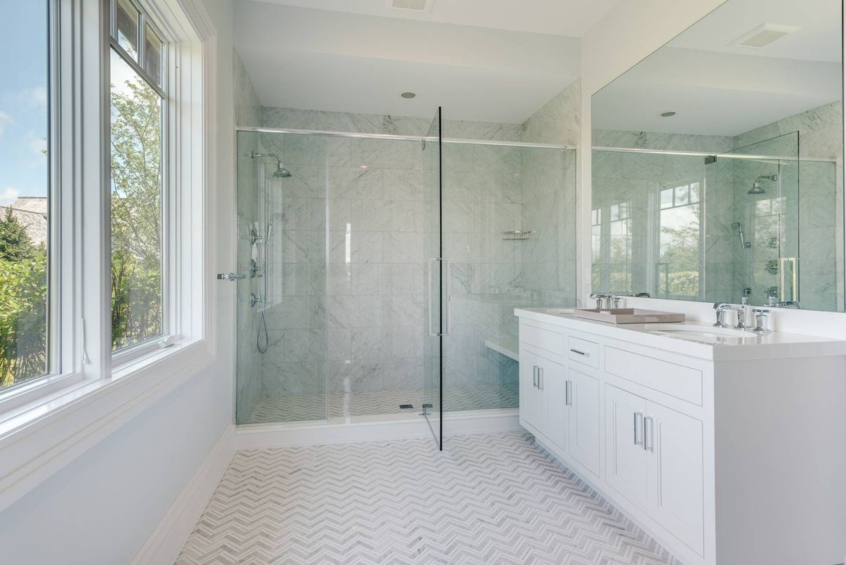 Bathroom, Dual Sink Vanities, Glass Shower, Interior, Marble Walls, Recessed Lighting