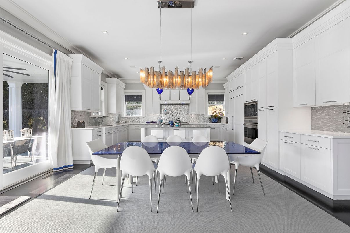 Chandelier, Dining room, Interior, Kitchen, Pendant Lights, Recessed Lighting, Stainless Steel Appliances, Wood Texture Flooring