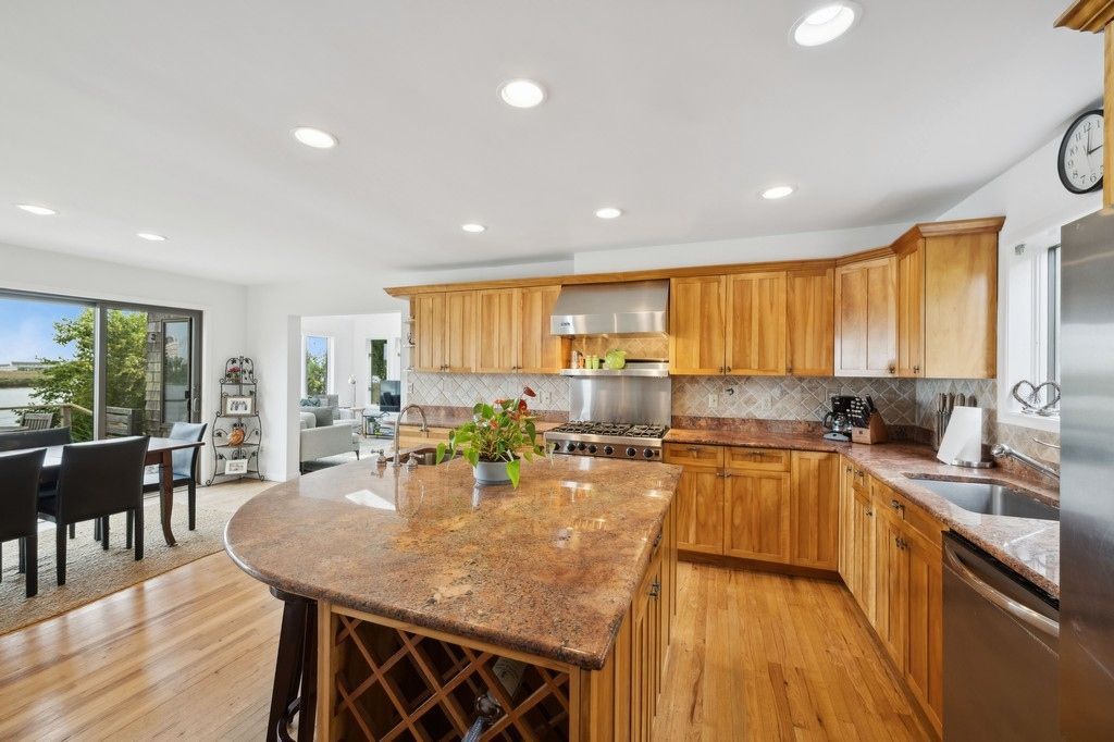 Dining room, Interior, Kitchen, Recessed Lighting, Stainless Steel Appliances, Wood Texture Flooring