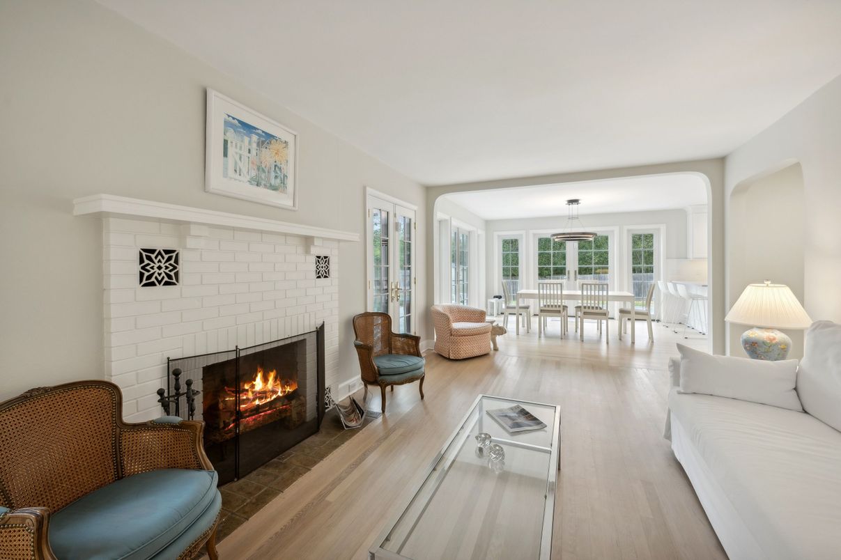 Dining room, Fireplace, Interior, Living room, Pendant Lights, Stone Walls, Wood Texture Flooring