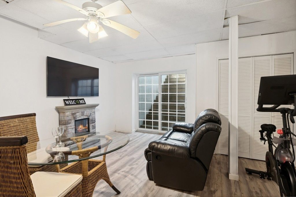 Fireplace, Fitness Equipment, Interior, Wood Texture Flooring