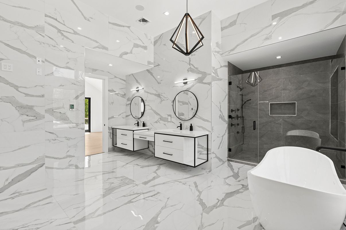 Bathroom, Dual Sink Vanities, Free Standing Baths, Glass Shower, Interior, Marble, Marble Walls, Pendant Lights, Recessed Lighting