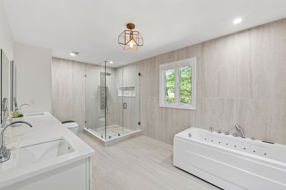 Bathroom, Dual Sink Vanities, Glass Shower, Interior, Recessed Lighting, Wood Texture Flooring