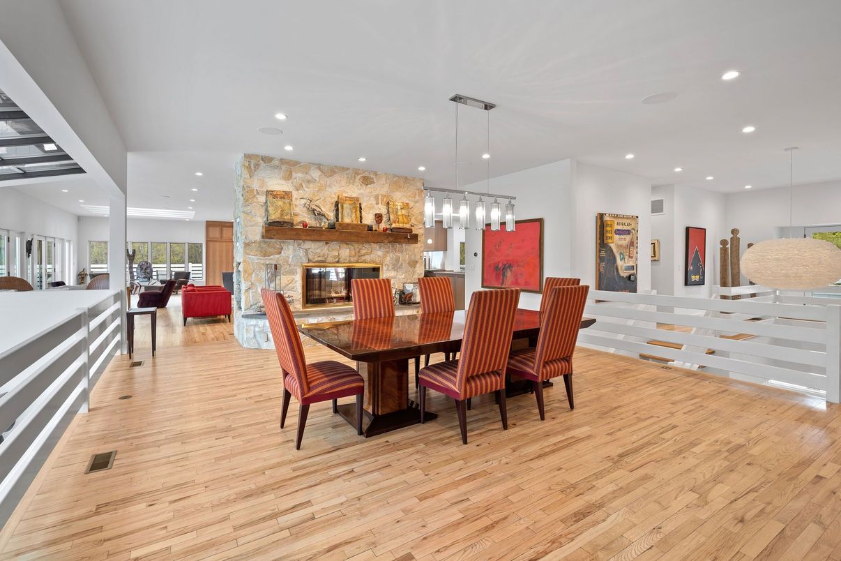 Dining room, Fireplace, Interior, Living room, Pendant Lights, Recessed Lighting, Wood Texture Flooring