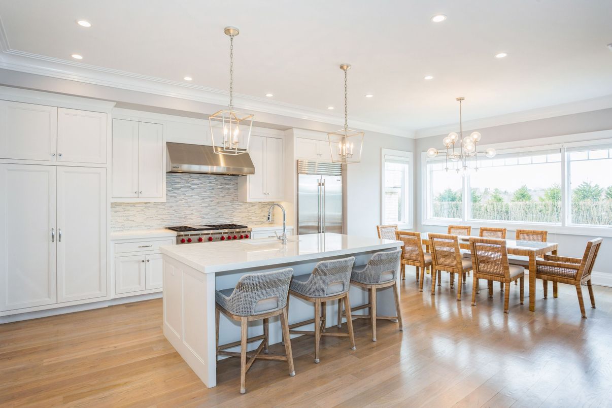 Dining room, Interior, Kitchen, Pendant Lights, Recessed Lighting, Stainless Steel Appliances, Wood Texture Flooring