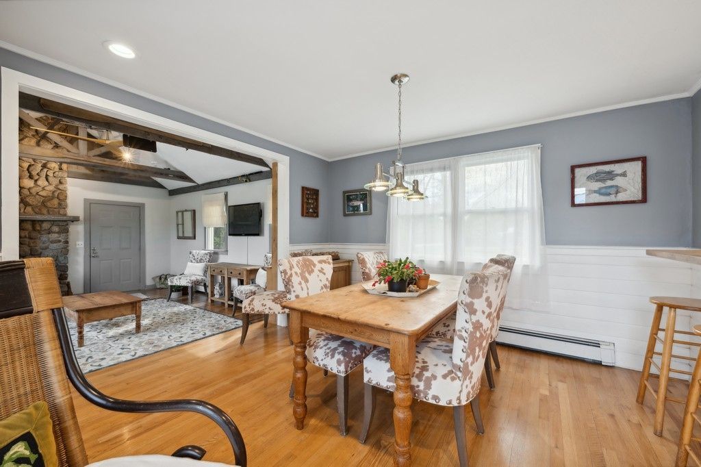 Dining room, Fireplace, Interior, Living room, Pendant Lights, Recessed Lighting, Wood Texture Flooring