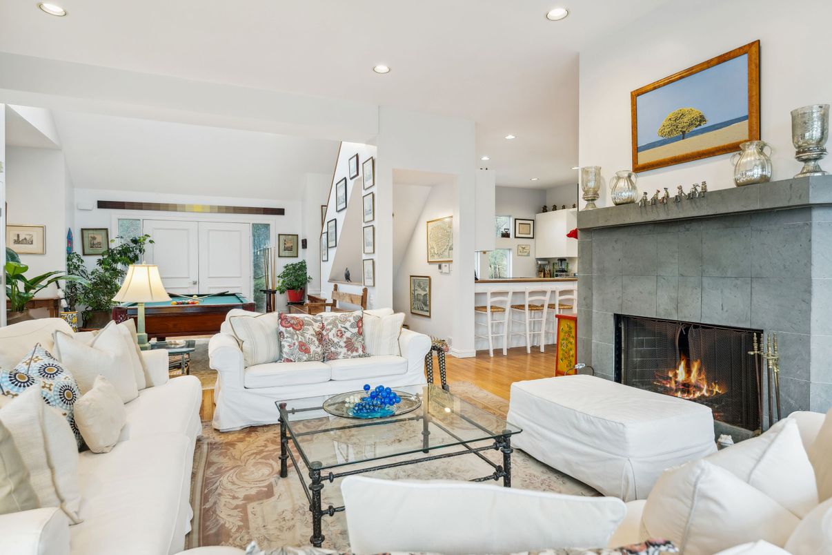 Billiard Table, Fireplace, Game Room, Interior, Living room, Recessed Lighting, Wood Texture Flooring