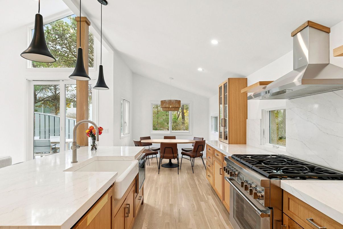 Dining room, Interior, Kitchen, Pendant Lights, Recessed Lighting, Stainless Steel Appliances, Wood Texture Flooring
