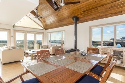 Dining room, Fireplace, Interior, Living room, Water, Wooden Ceilings, Wood Texture Flooring