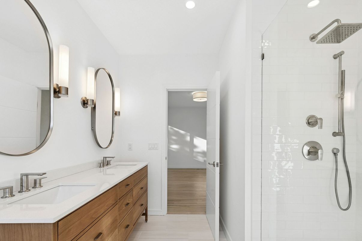 Bathroom, Dual Sink Vanities, Glass Shower, Interior, Recessed Lighting, Wood Texture Flooring