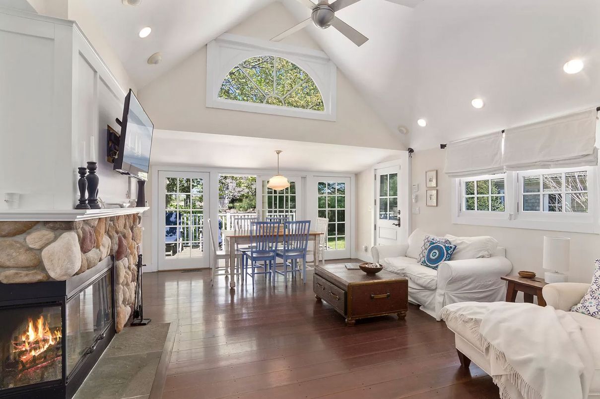 Dining room, Fireplace, Interior, Living room, Pendant Lights, Recessed Lighting, Wood Texture Flooring