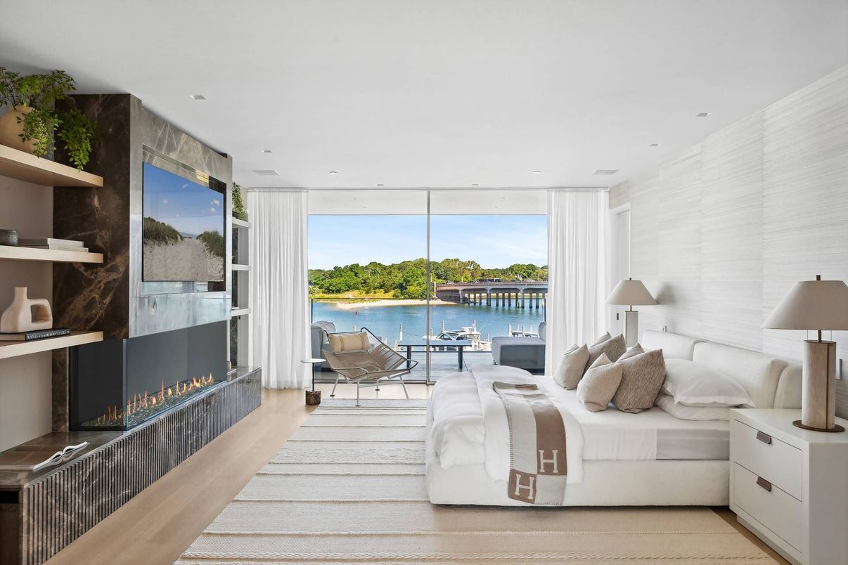 Bedroom, Fireplace, Interior, Recessed Lighting, Water, Wood Texture Flooring