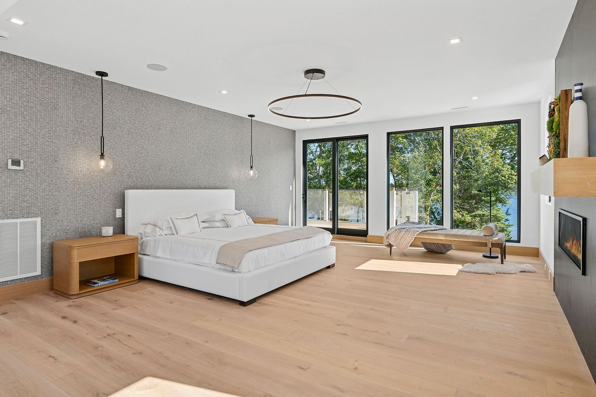 Bedroom, Fireplace, Interior, Pendant Lights, Recessed Lighting, Wood Texture Flooring