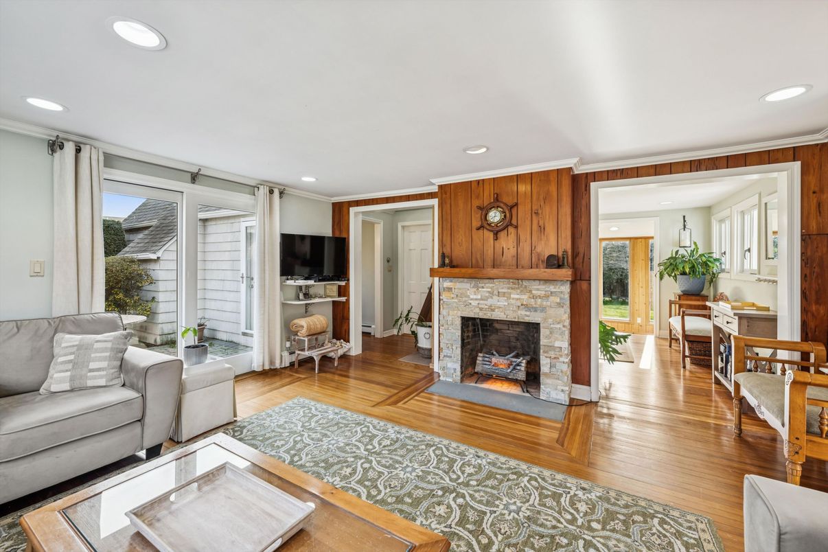 Dining room, Fireplace, Interior, Living room, Recessed Lighting, Wood Texture Flooring, Wooden Walls