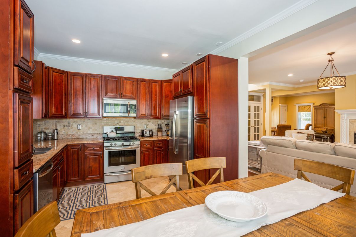 Fireplace, Interior, Kitchen, Living room, Pendant Lights, Recessed Lighting, Stainless Steel Appliances