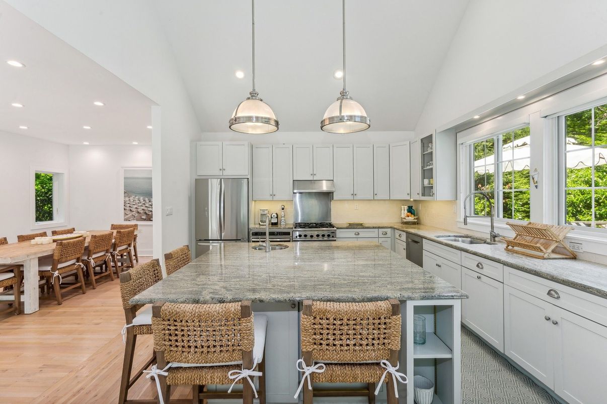 Dining room, Interior, Kitchen, Pendant Lights, Recessed Lighting, Stainless Steel Appliances, Wood Texture Flooring