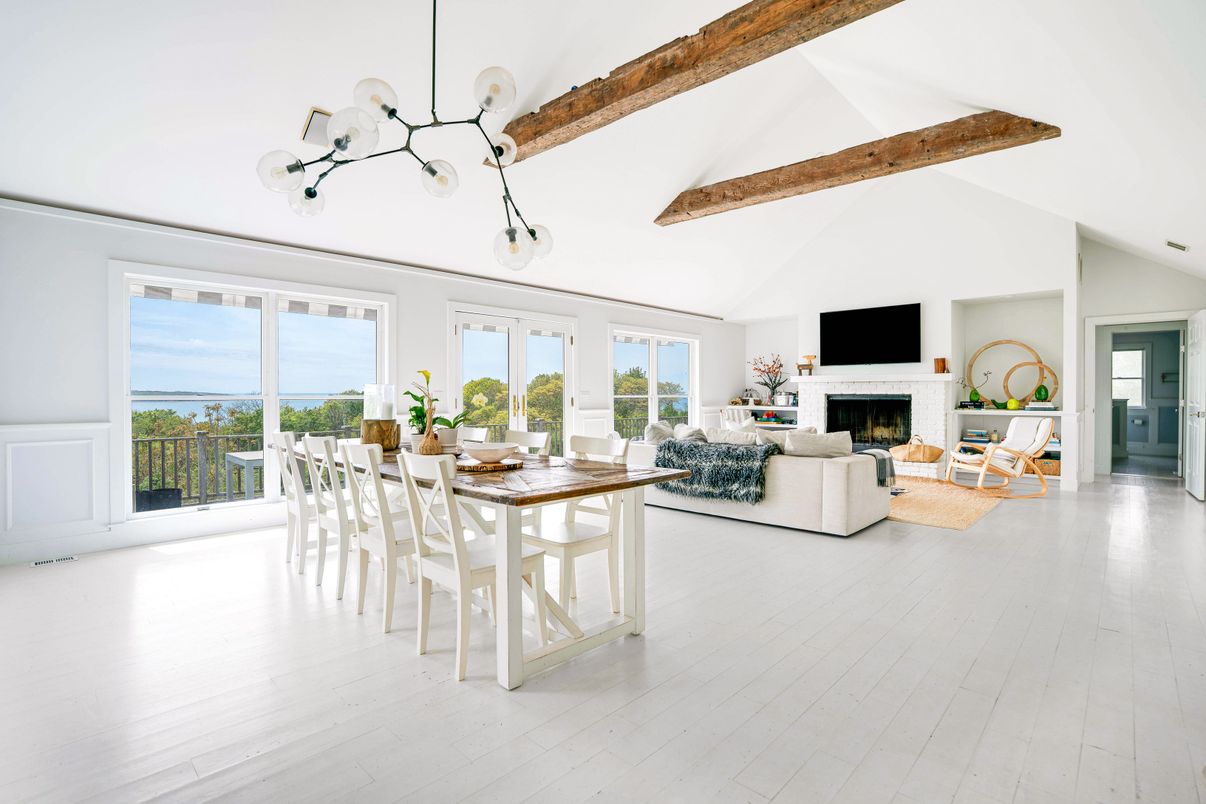 Dining room, Fireplace, Interior, Living room, Pendant Lights, Water, Wooden Beams, Wood Texture Flooring