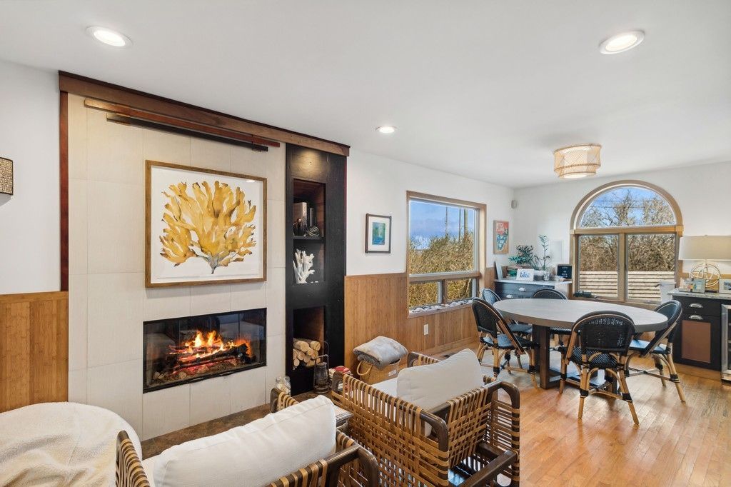 Dining room, Fireplace, Interior, Living room, Recessed Lighting, Wood Texture Flooring