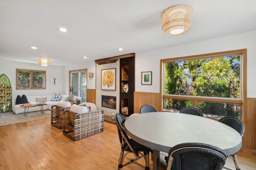 Dining room, Fireplace, Interior, Living room, Recessed Lighting, Wood Texture Flooring