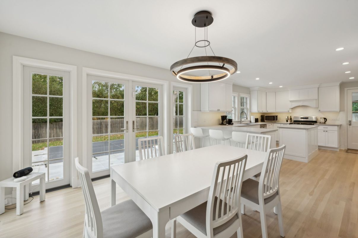 Dining room, Interior, Kitchen, Pendant Lights, Recessed Lighting, Stainless Steel Appliances, Wood Texture Flooring