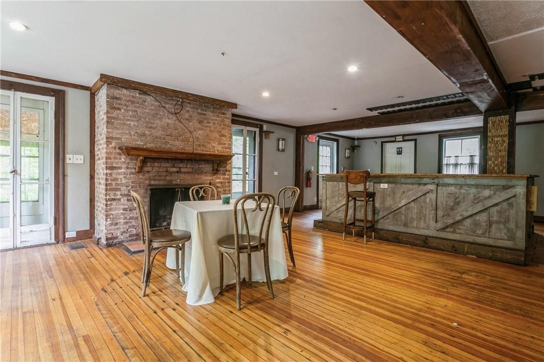 Fireplace, Interior, Recessed Lighting, Stone Walls, Wood Texture Flooring