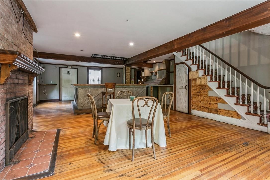 Dining room, Fireplace, Interior, Recessed Lighting, Wood Texture Flooring