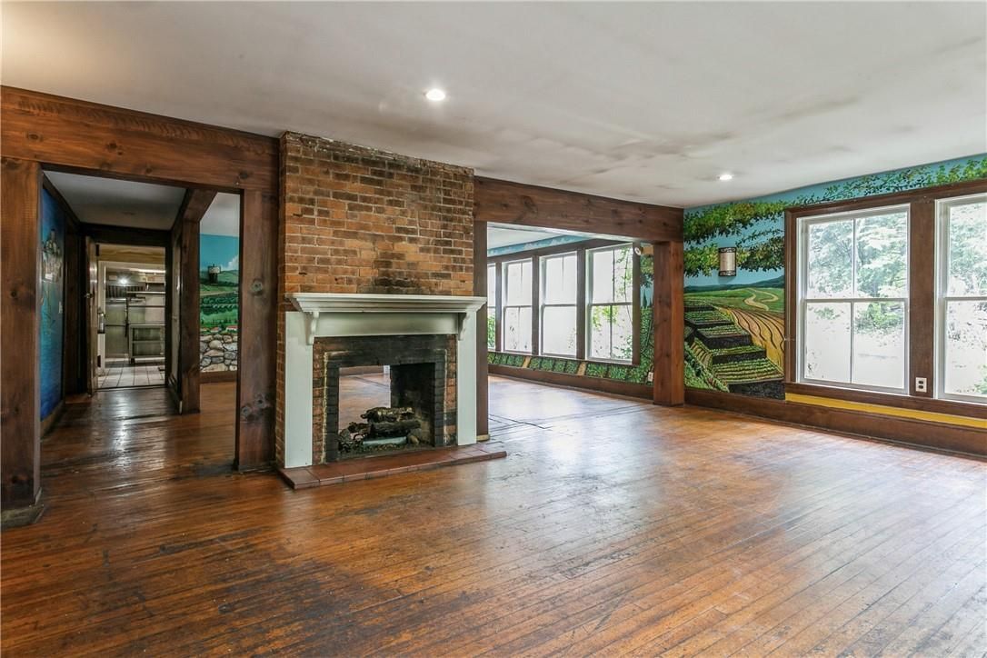 Empty room, Fireplace, Interior, Recessed Lighting, Stone Walls, Wood Texture Flooring