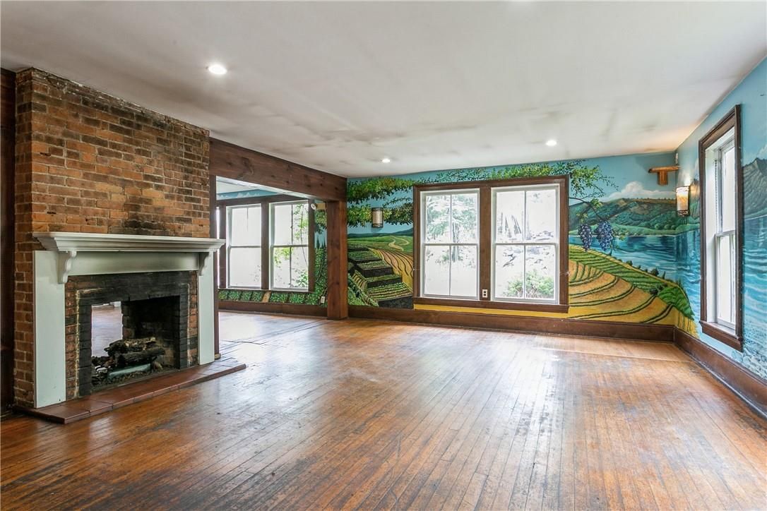 Empty room, Fireplace, Interior, Recessed Lighting, Stone Walls, Wood Texture Flooring