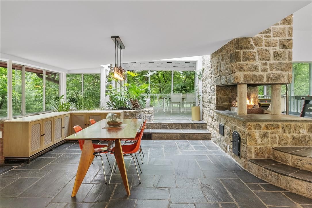 Dining room, Fireplace, Interior, Pendant Lights, Stone Walls, Sun Room