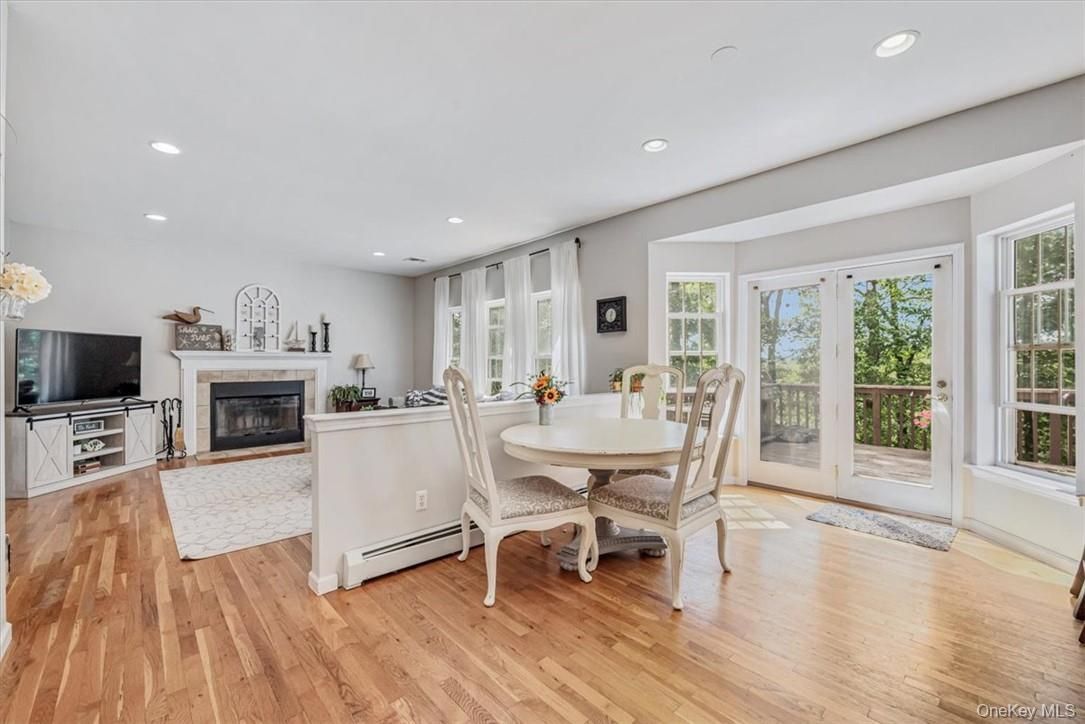 Dining room, Fireplace, Interior, Recessed Lighting, Wood Texture Flooring