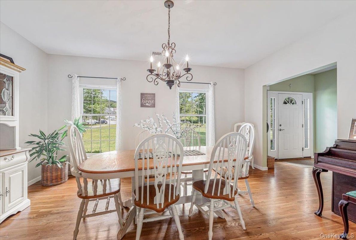 Chandelier, Dining room, Interior, Piano, Wood Texture Flooring