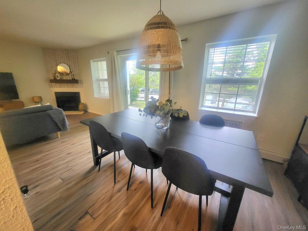 Dining room, Fireplace, Interior, Pendant Lights, Wood Texture Flooring