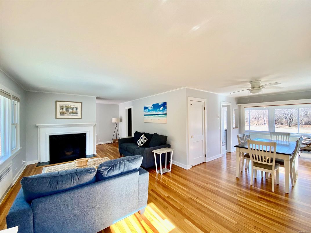 Dining room, Fireplace, Interior, Living room, Wood Texture Flooring