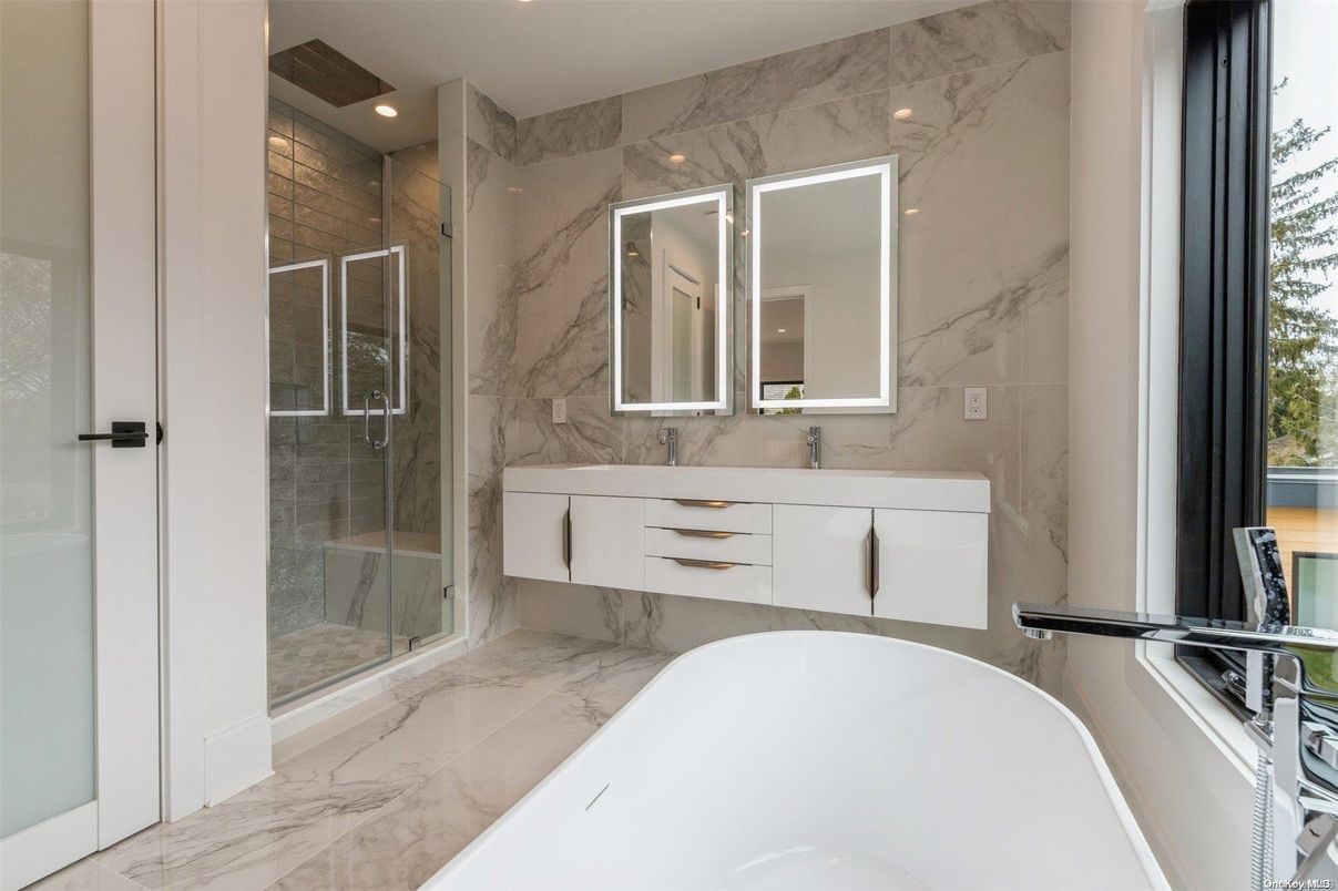 Bathroom, Dual Sink Vanities, Free Standing Baths, Glass Shower, Interior, Marble, Marble Walls, Recessed Lighting