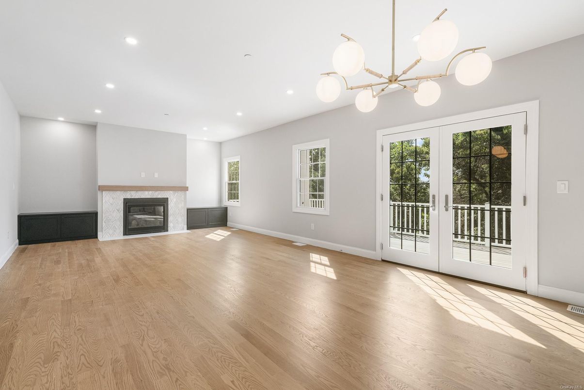 Empty room, Fireplace, Interior, Pendant Lights, Recessed Lighting, Wood Texture Flooring