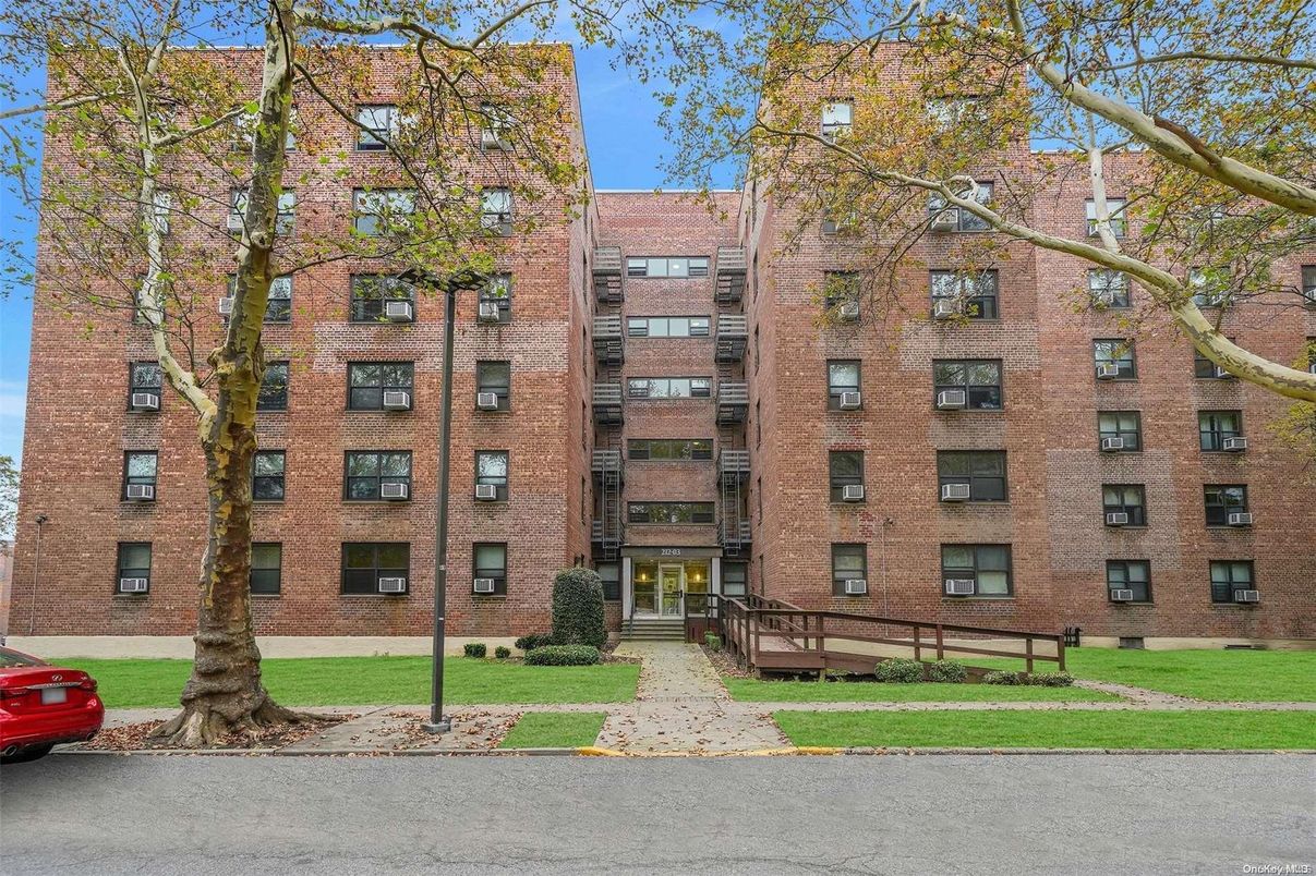 Exterior, Facade, Brick Facade, Condo Building