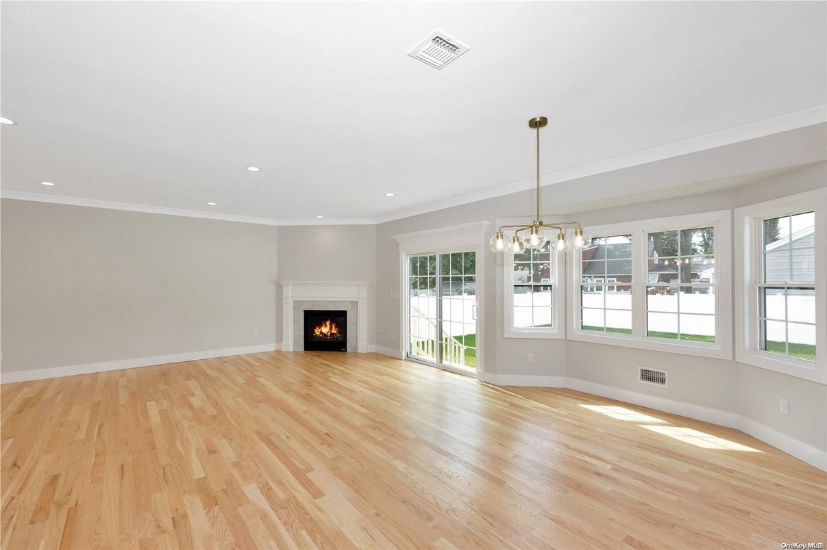 Empty room, Fireplace, Interior, Pendant Lights, Recessed Lighting, Wood Texture Flooring