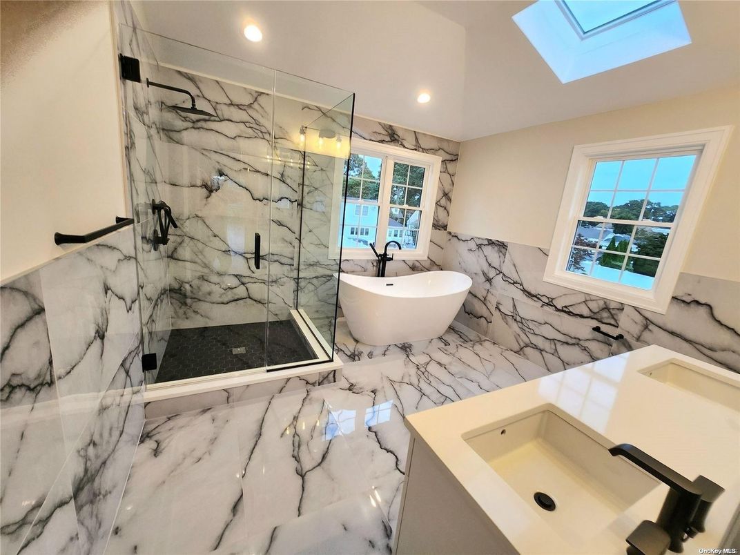 Bathroom, Free Standing Baths, Glass Shower, Interior, Marble, Marble Walls, Recessed Lighting