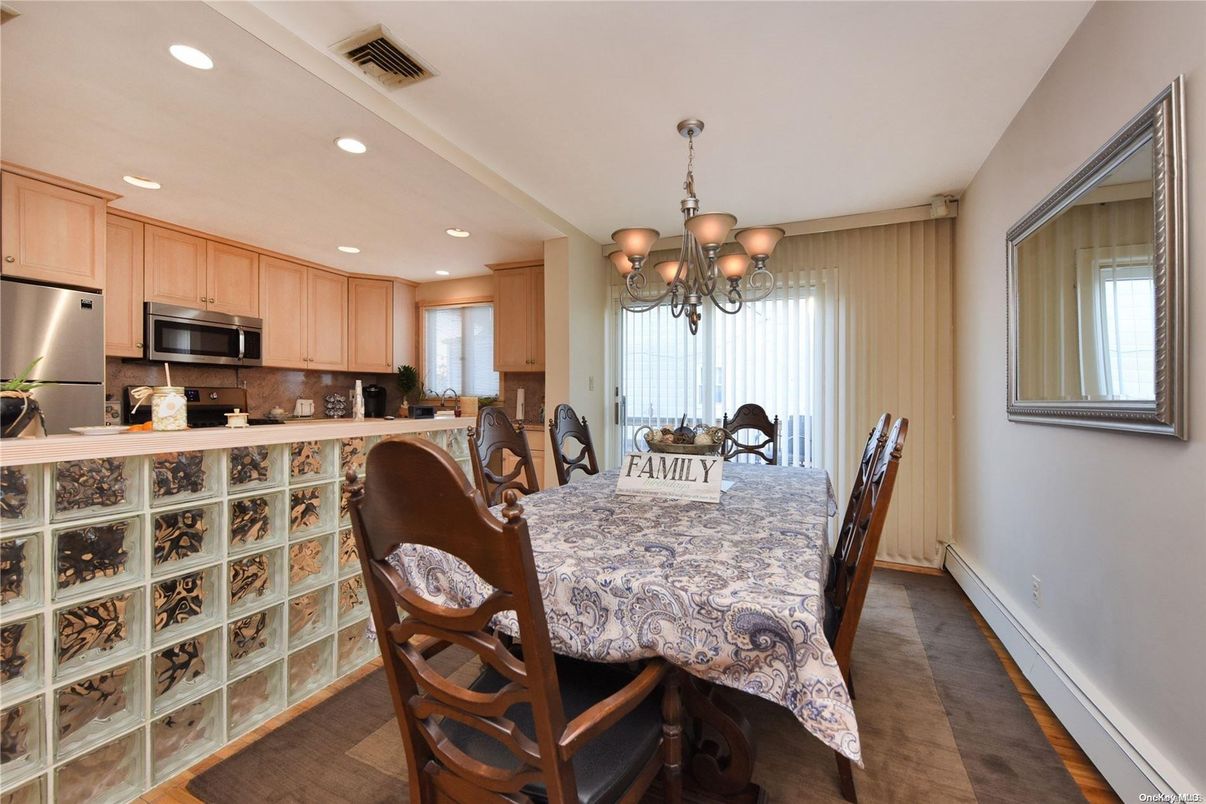Chandelier, Dining room, Interior, Kitchen, Recessed Lighting, Stainless Steel Appliances, Wood Texture Flooring