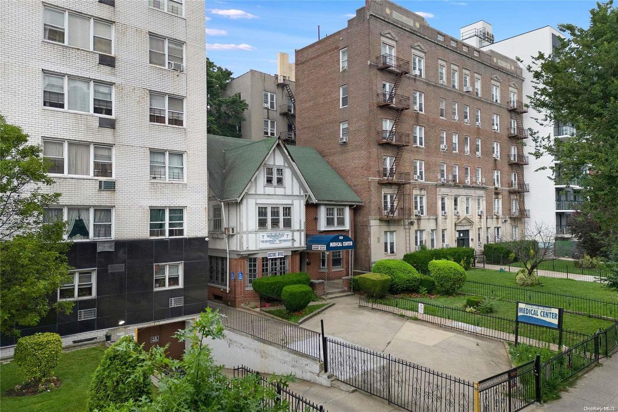 Exterior, Facade, Brick Facade, Condo Building